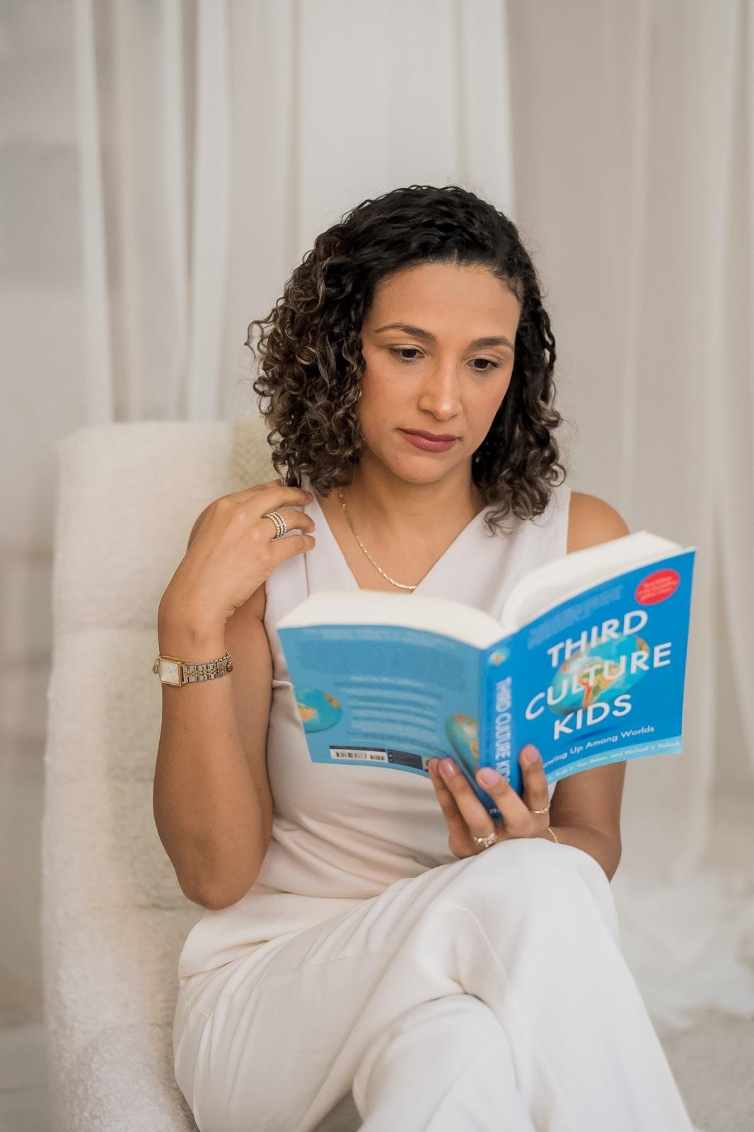 Juliana Silva reading Third Culture Kids: Growing Up Among Worlds